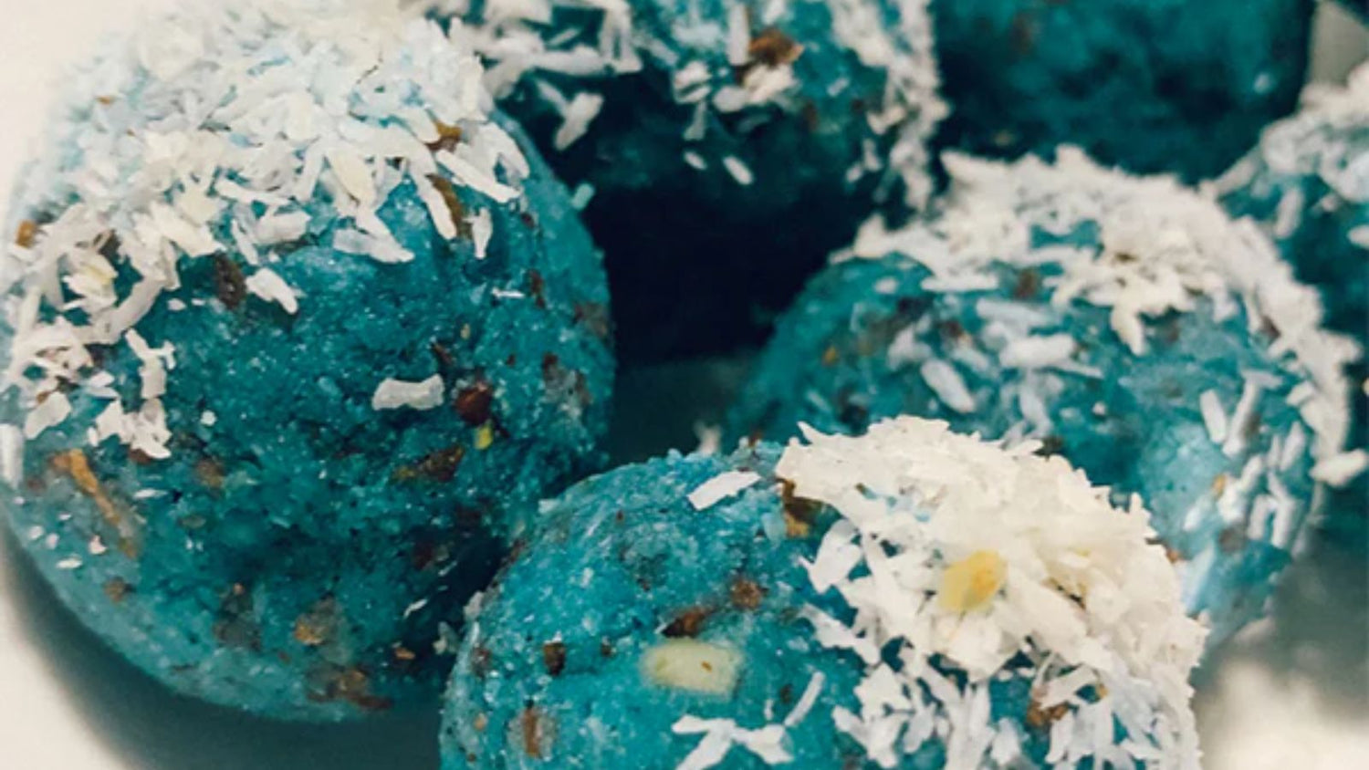 Almond-Coconut Bliss Balls featuring BlueMAJIK powder.