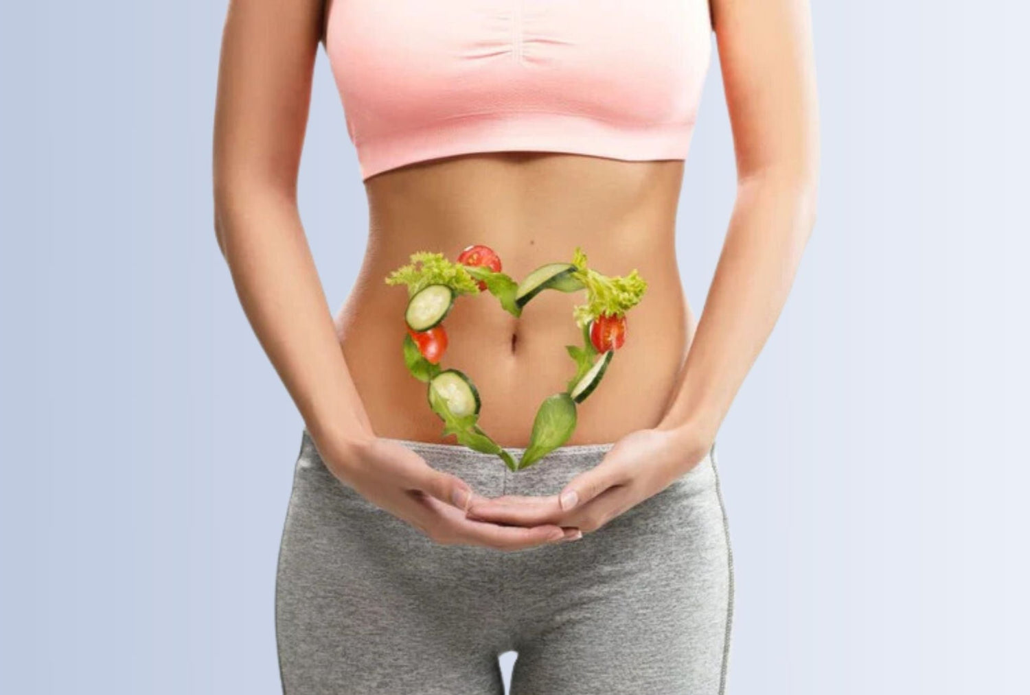 Healthy gut concept with a woman holding her stomach, showing a heart made from vegetables, representing the digestive benefits of E3Probiotics Gut Rescue, and E3Enzymes Supreme, digestive support products.